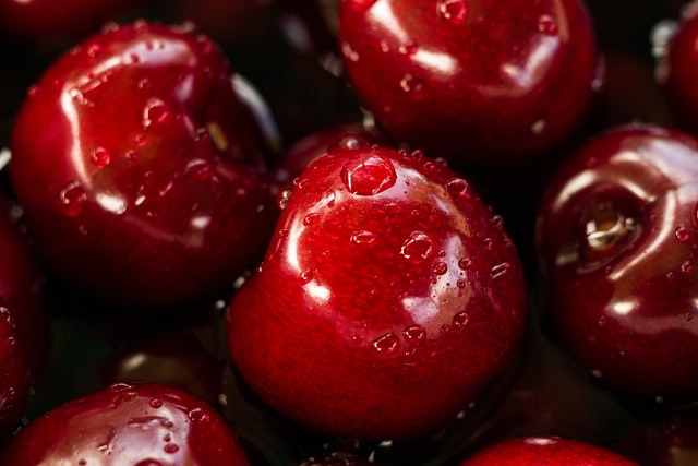 A bowl containig cherries A bowl containig cherries